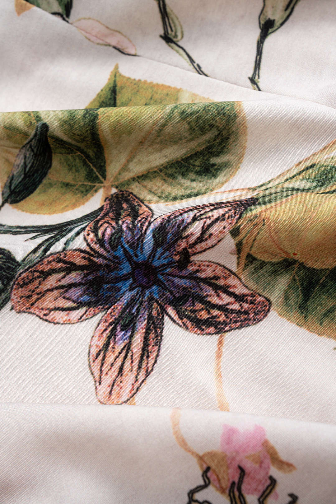 Haut à manches longues à col en V et motif floral, avec lien à nouer