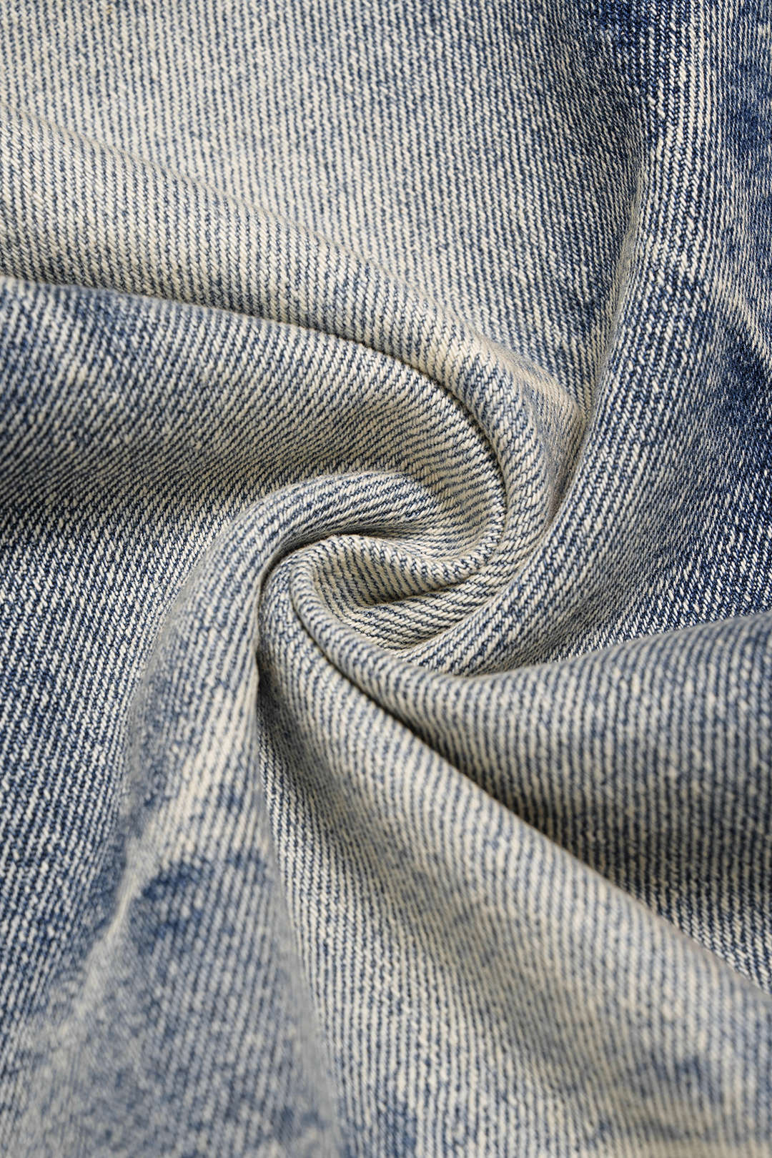 Jeans larges asymétriques en denim effiloché