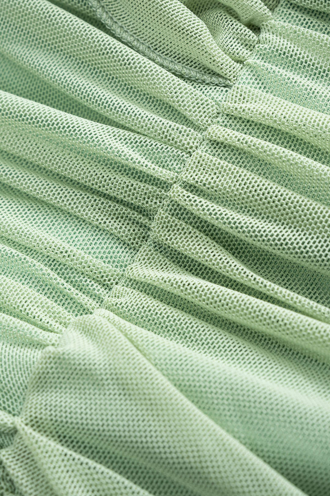 Ärmelloses Mini-Kleid mit Netzeinsätzen zum Binden