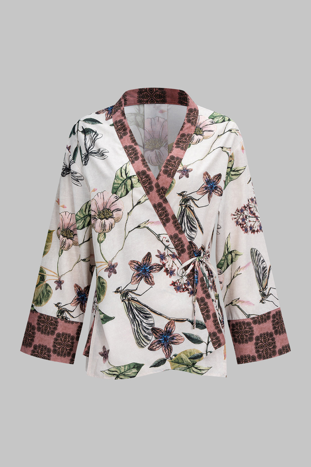 Haut à manches longues à col en V et motif floral, avec lien à nouer