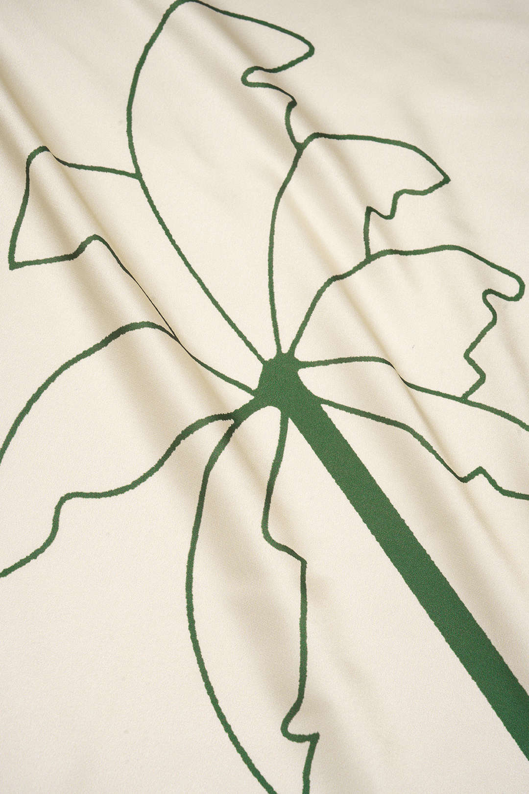 Haut sans manches dos nu en satin à imprimé floral contrastant avec col halter à nouer