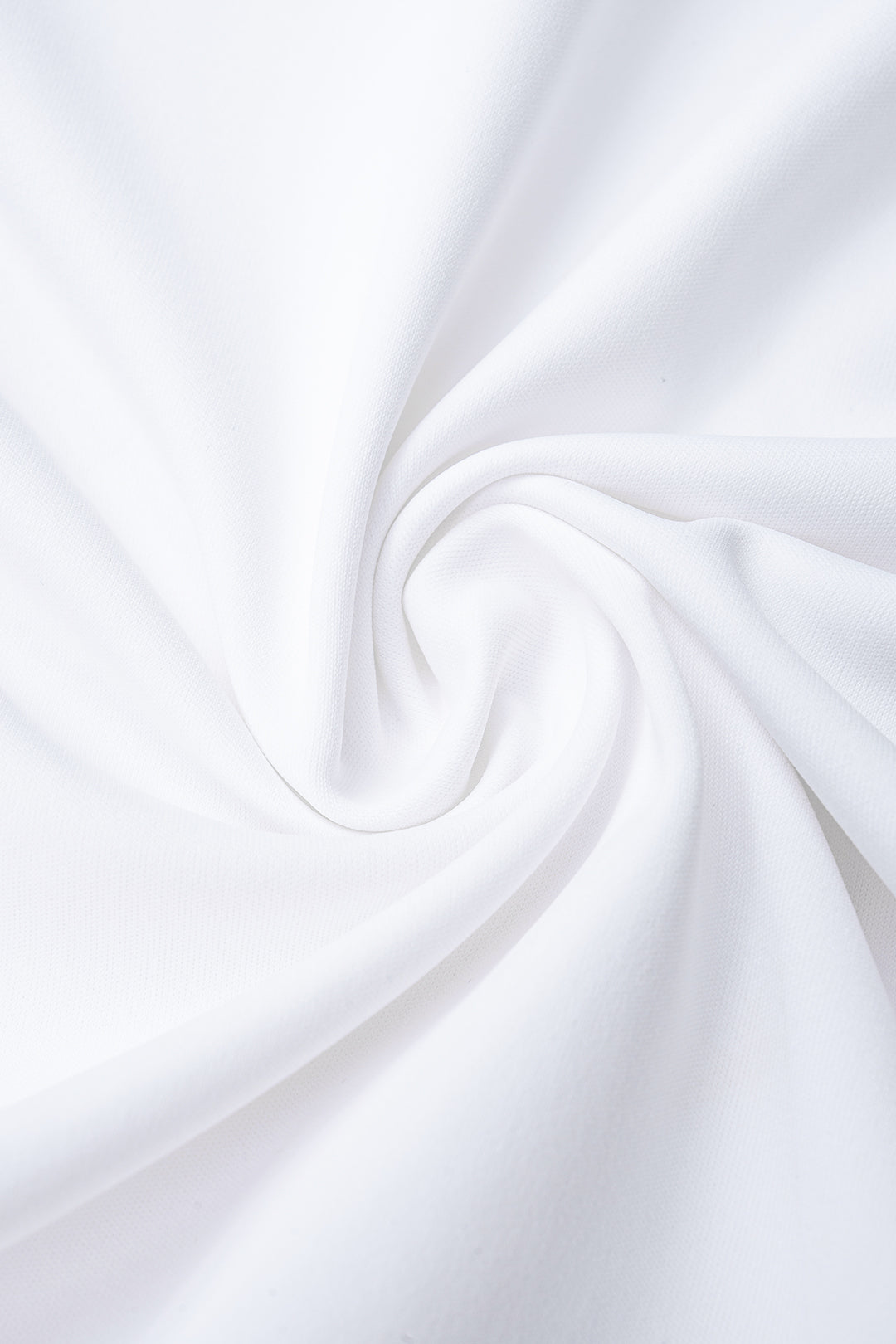 Mini-robe sans manches découpée avec décolleté en V et nœud sur le devant