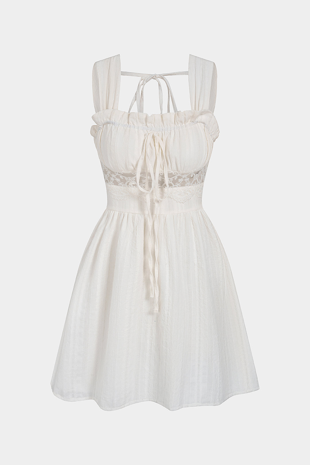 Mini-robe sans manches à patchwork et garniture en dentelle avec liens à nouer