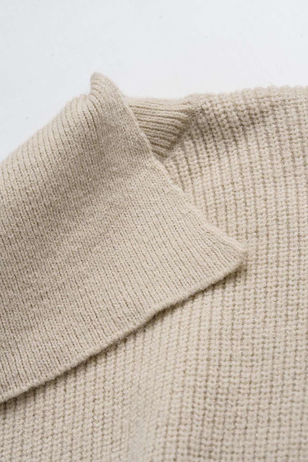 Knit High Collar Asymmetrical Hem Long-Sleeve Top