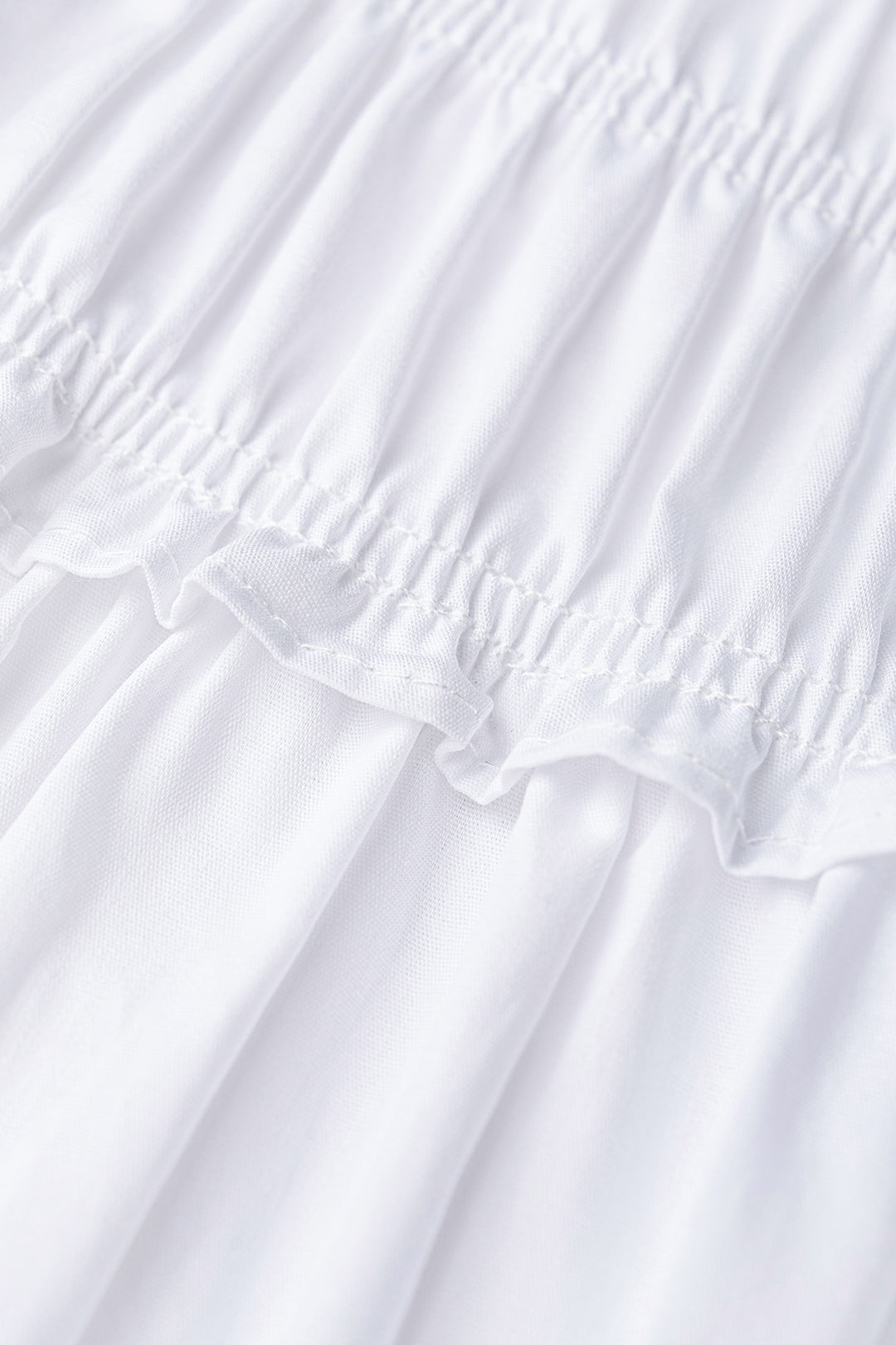 Robe longue sans manches unie à volants