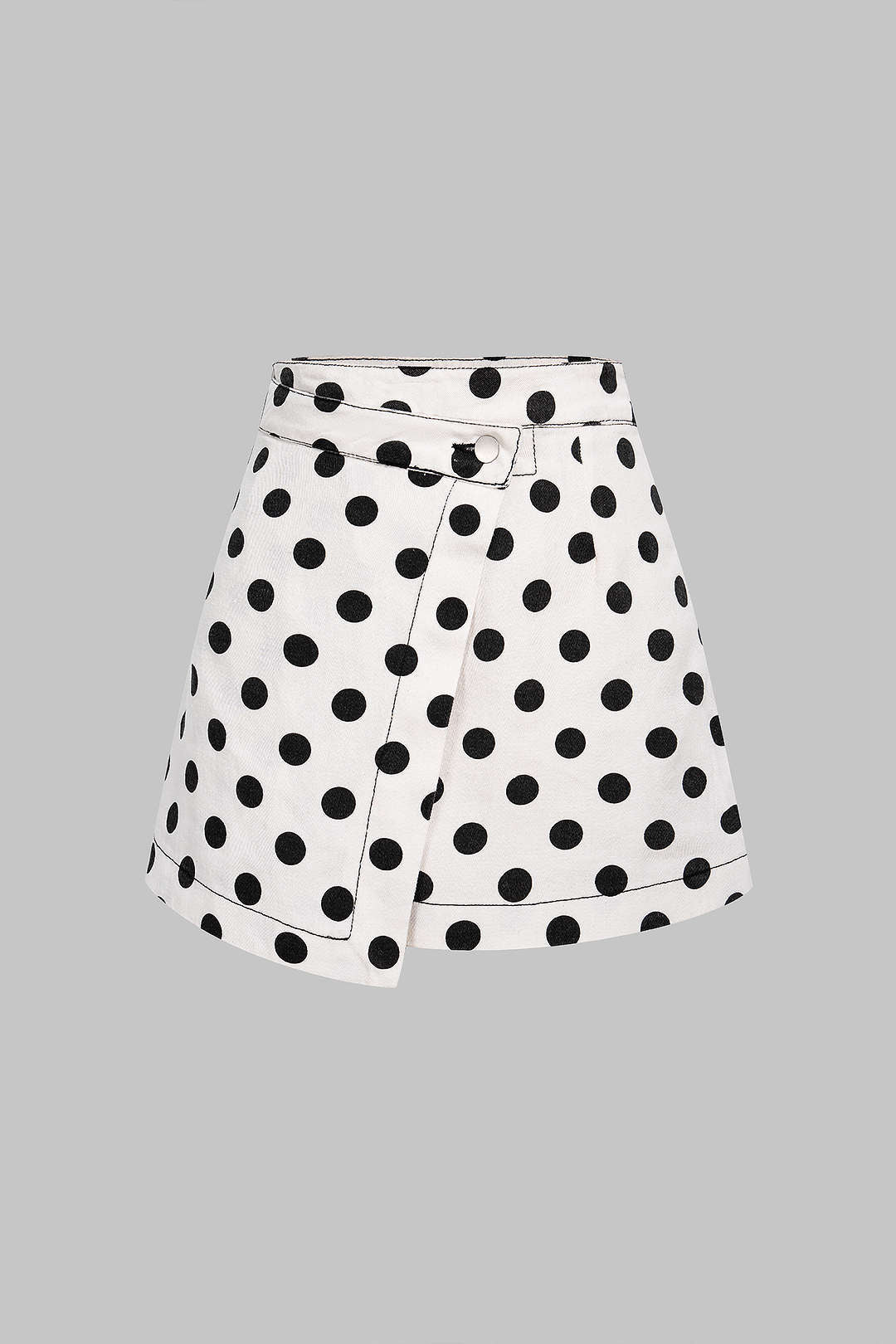 Jupe asymétrique taille haute à pois