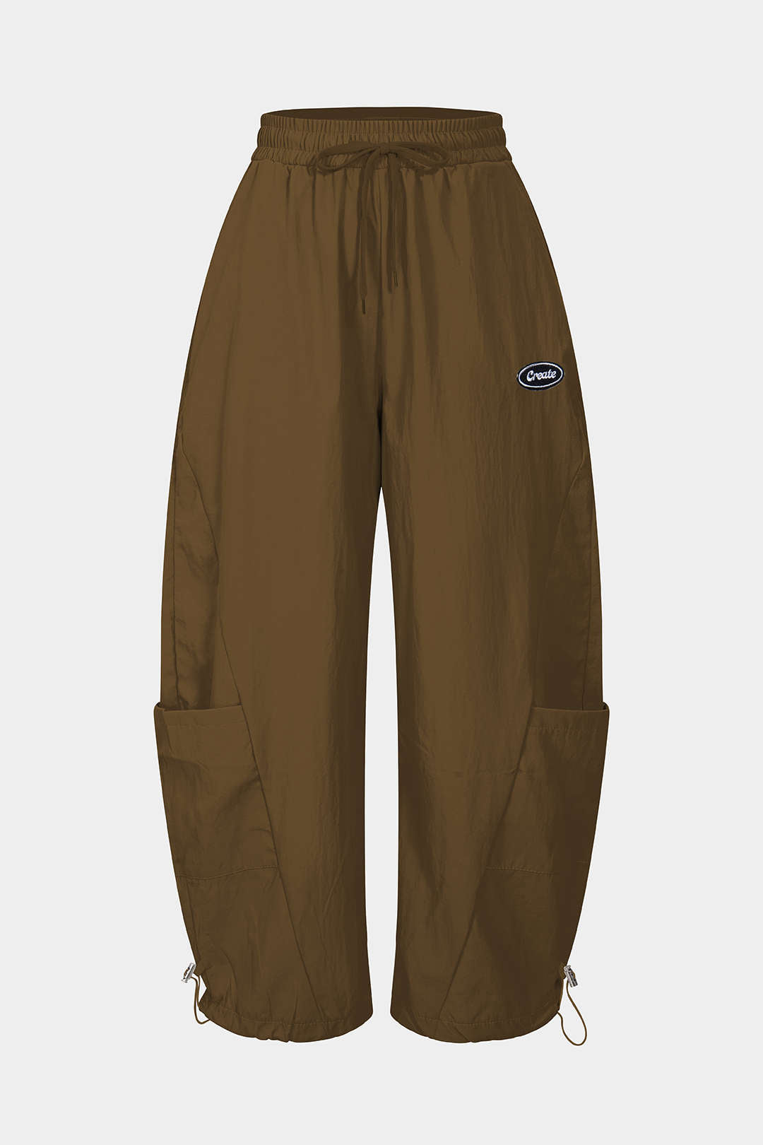 Pantalon coupe tonneau large avec cordon de serrage et poches