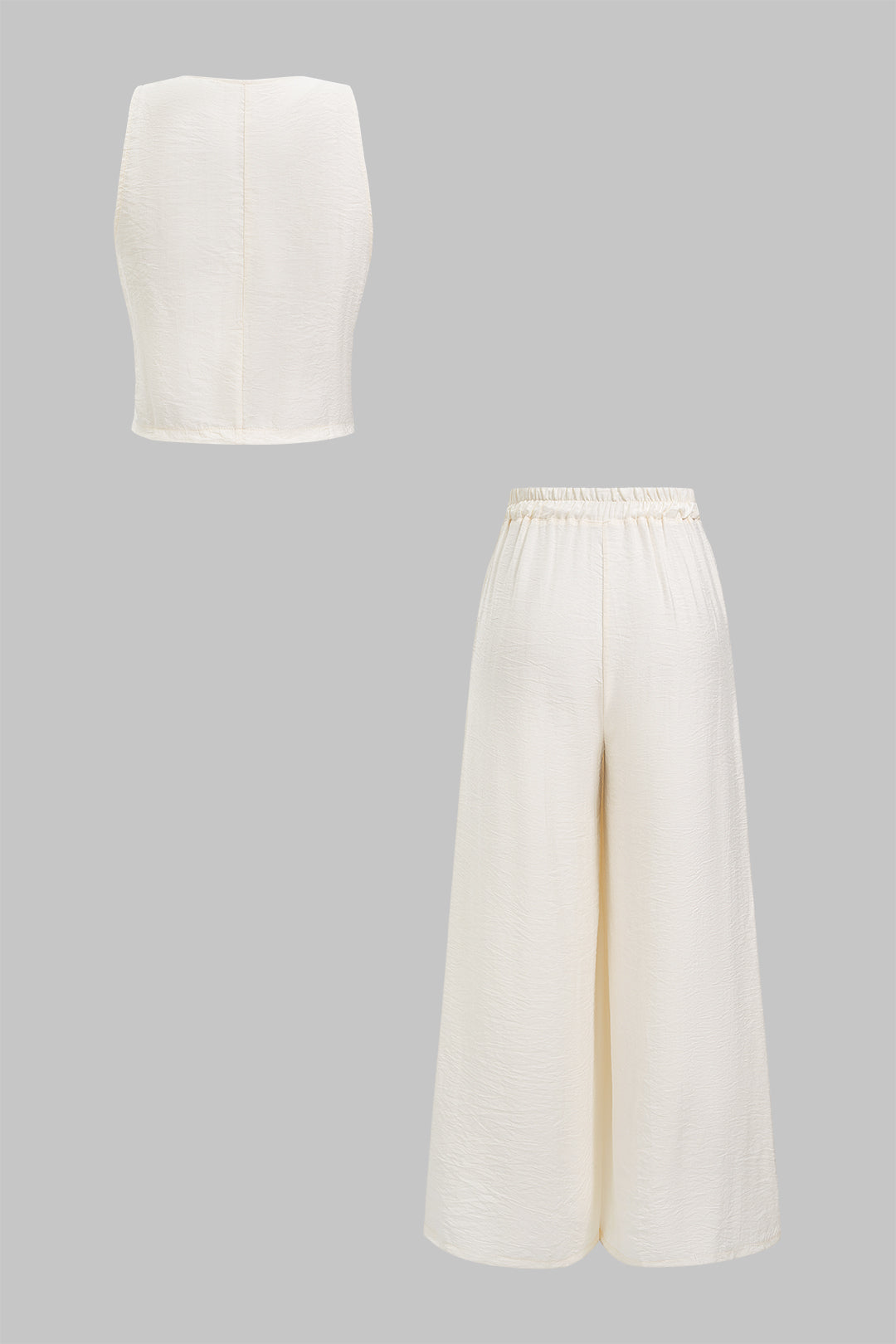 Set aus Weste mit V-Ausschnitt und Knopfleiste und Hose mit weitem Bein