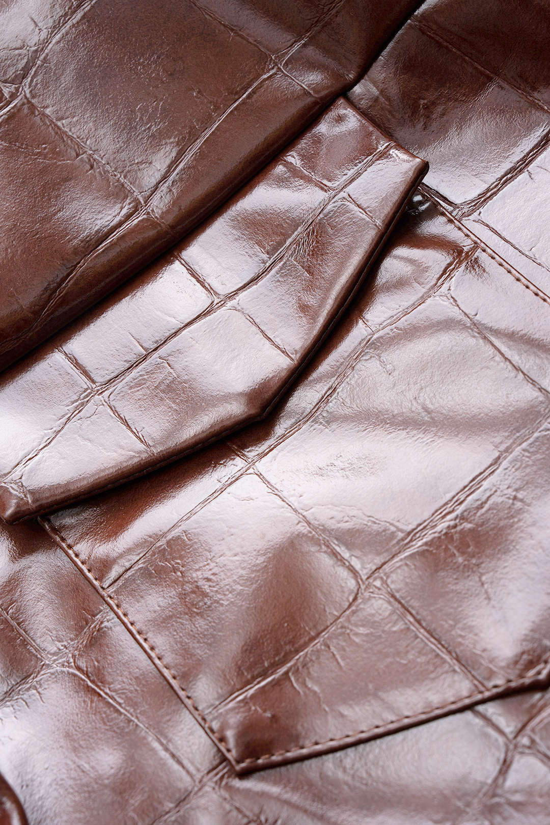 Veste courte en similicuir à poches