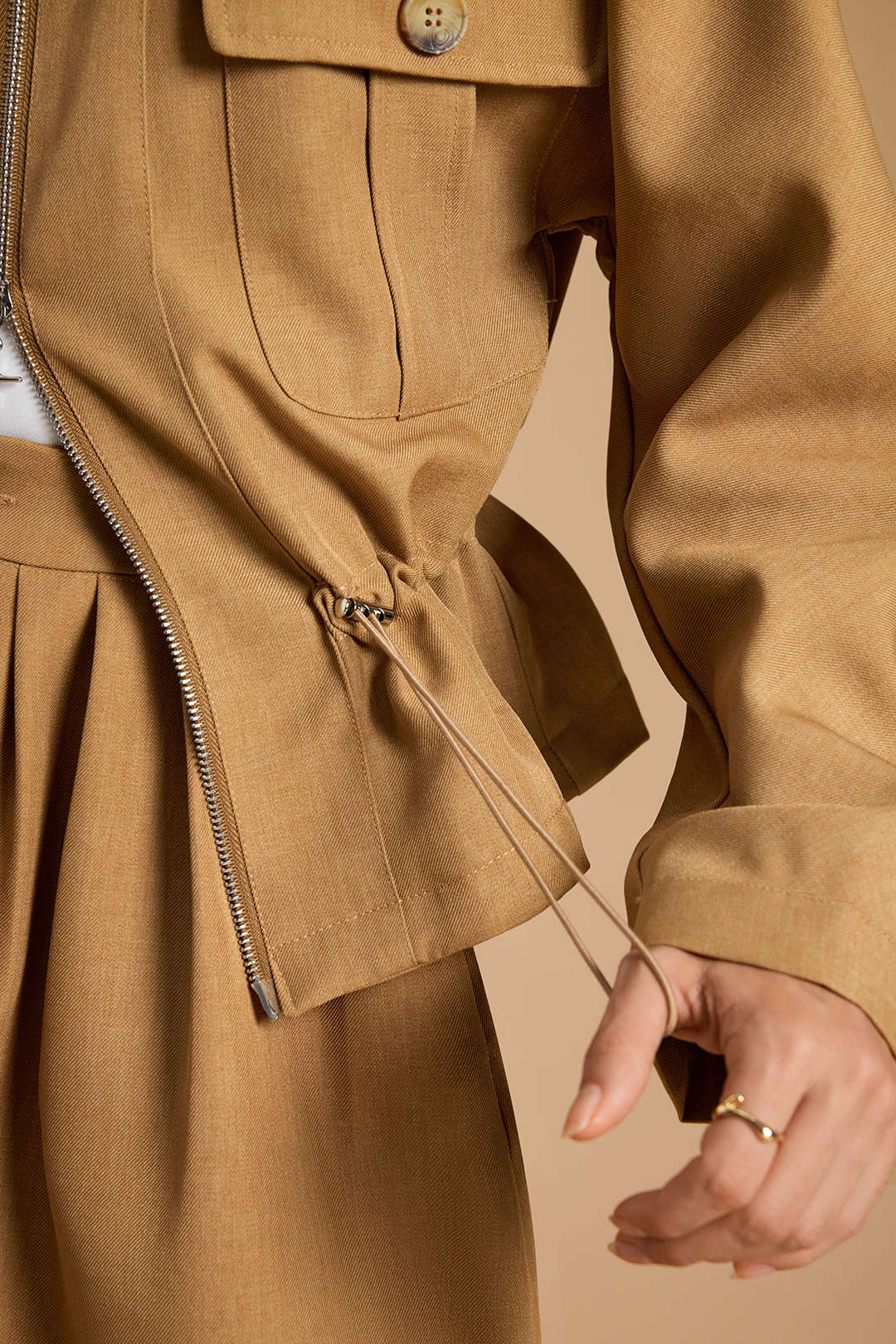 Veste avec fermeture éclair, patchwork, cordon de serrage et manches chauve-souris