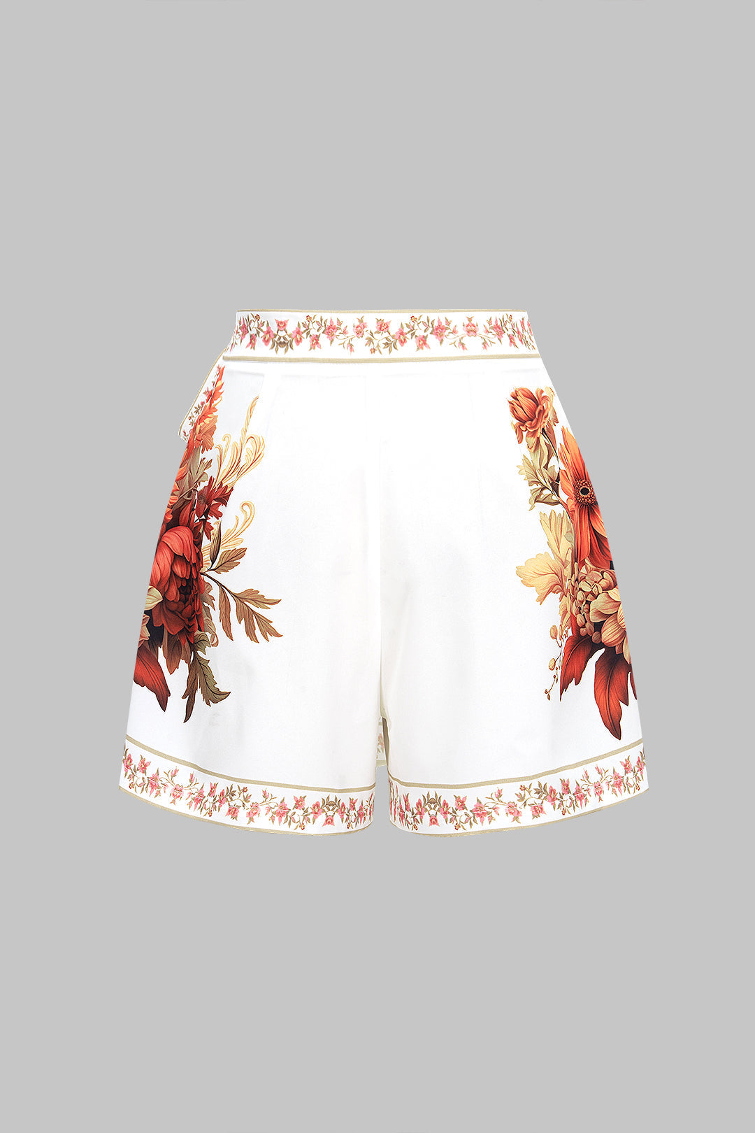Shorts mit Blumenmuster, Wickeldetail und asymmetrischem Saum