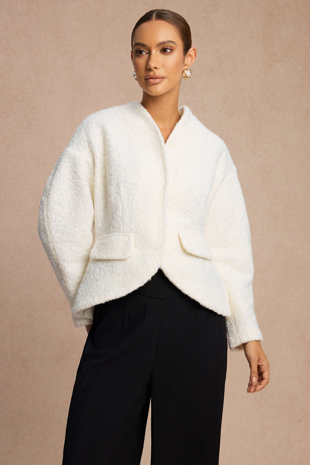 Veste courte en laine à fausses poches