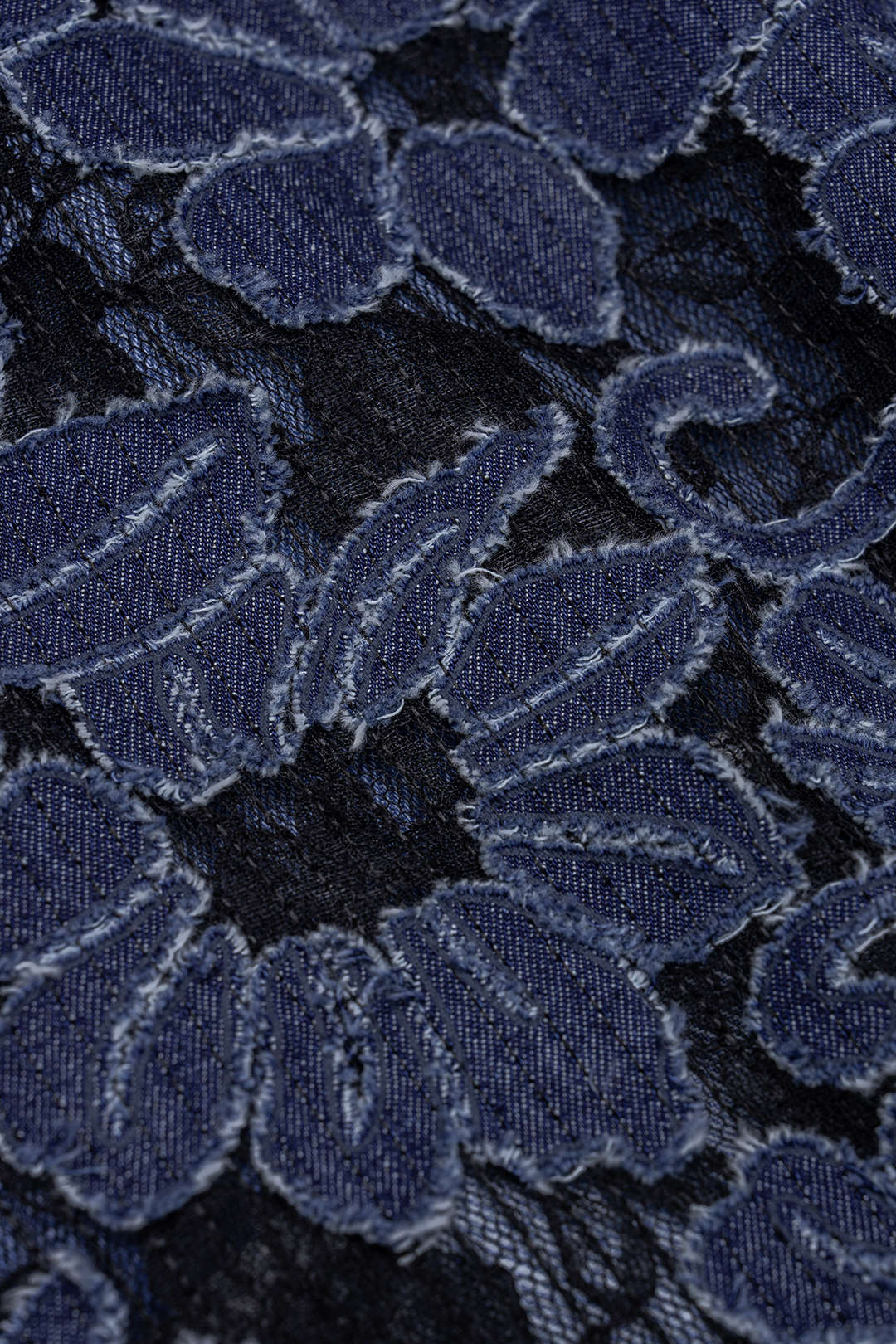 Asymmetrischer Jeans-Patchwork-Rock mit Reißverschluss und Fransen