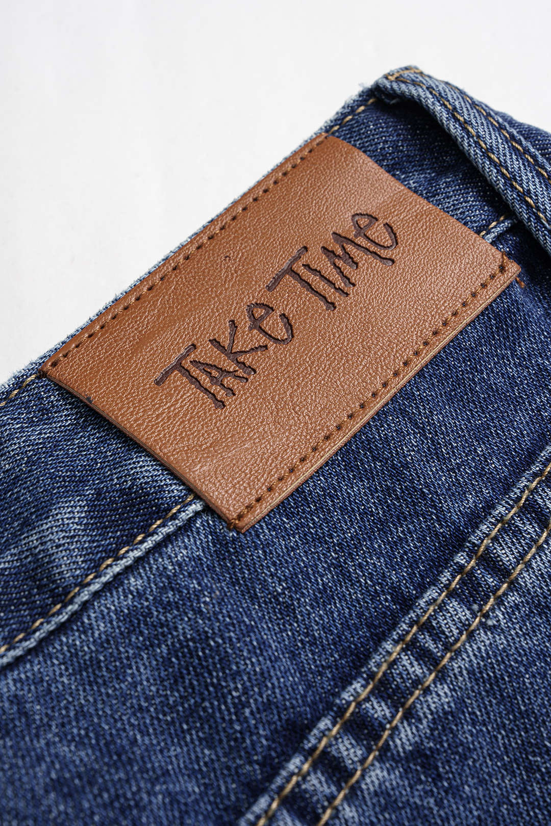 Jean asymétrique en denim taille haute