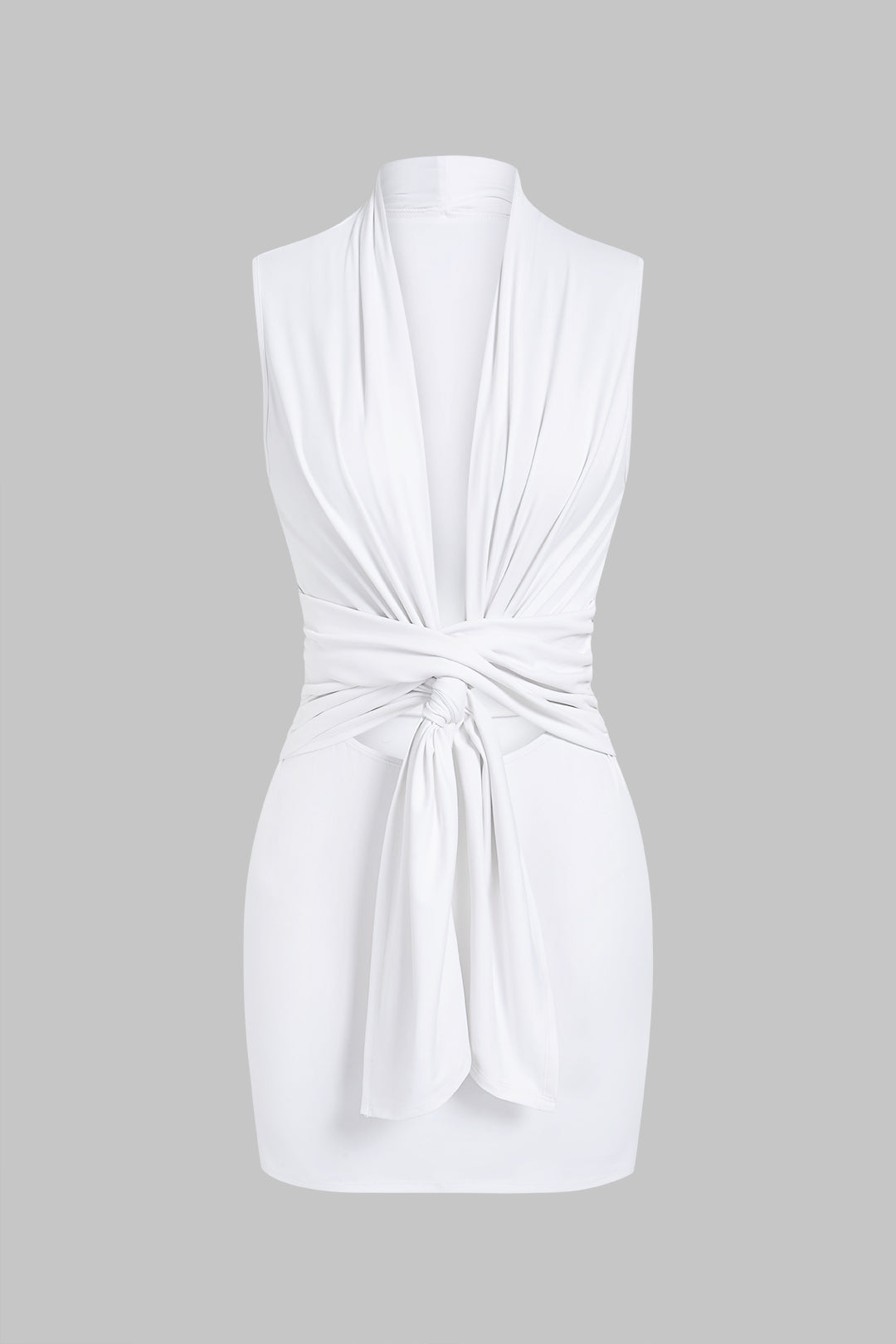 Mini-robe sans manches découpée avec décolleté en V et nœud sur le devant