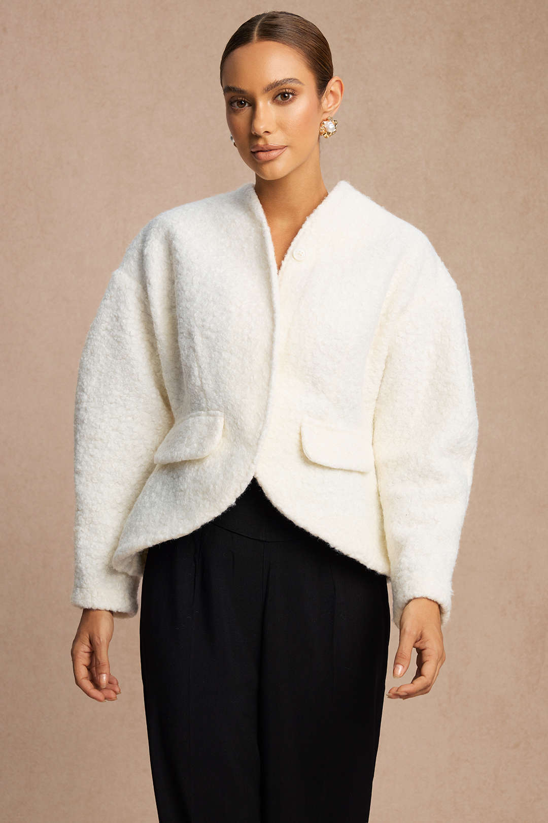 Veste courte en laine à fausses poches