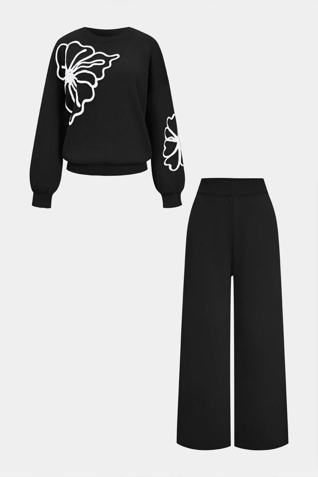 Strickset bestehend aus Rundhals-Langarmshirt mit Stickerei und weiter Hose