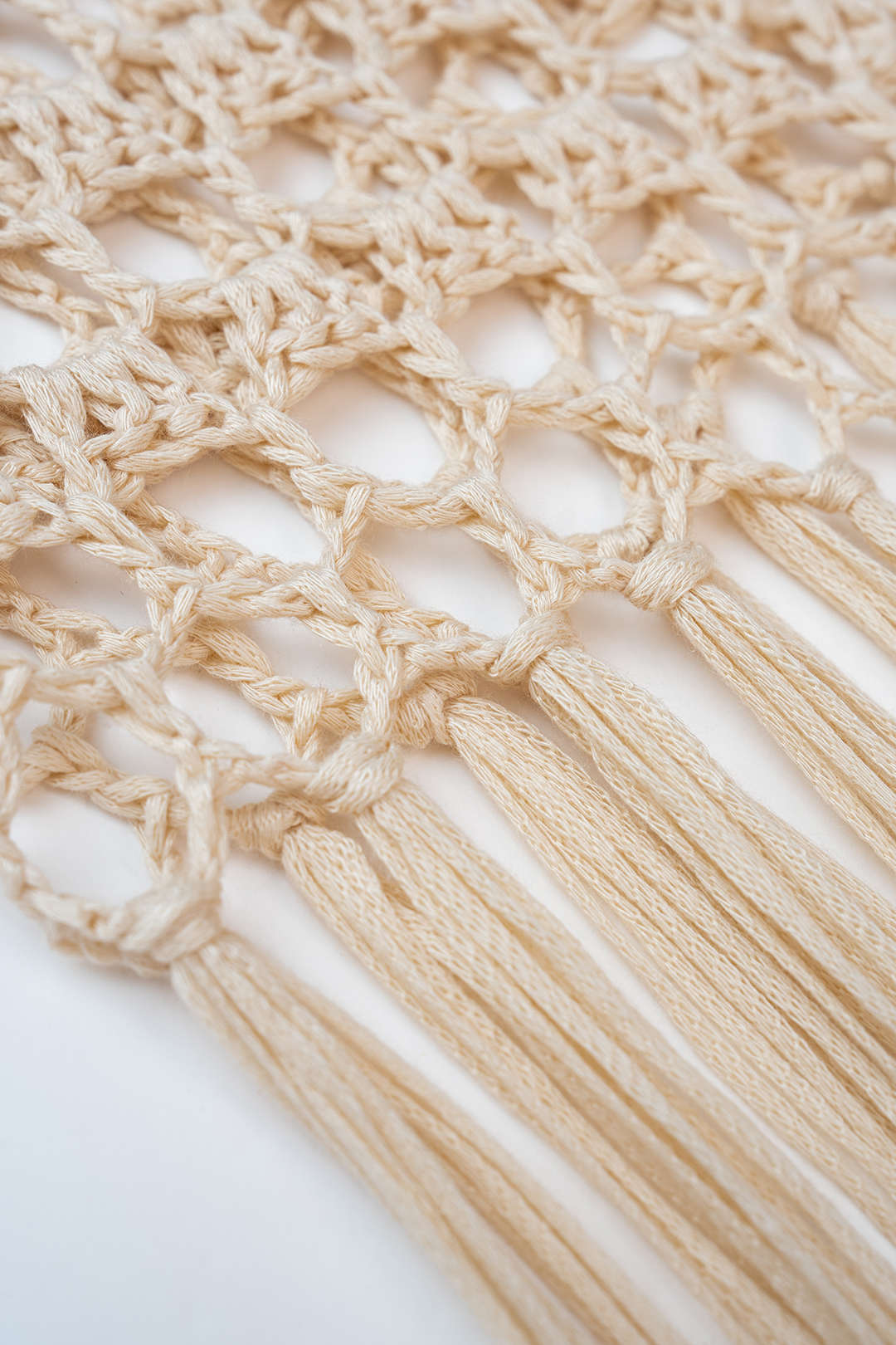 Jupe en crochet ajourée à franges