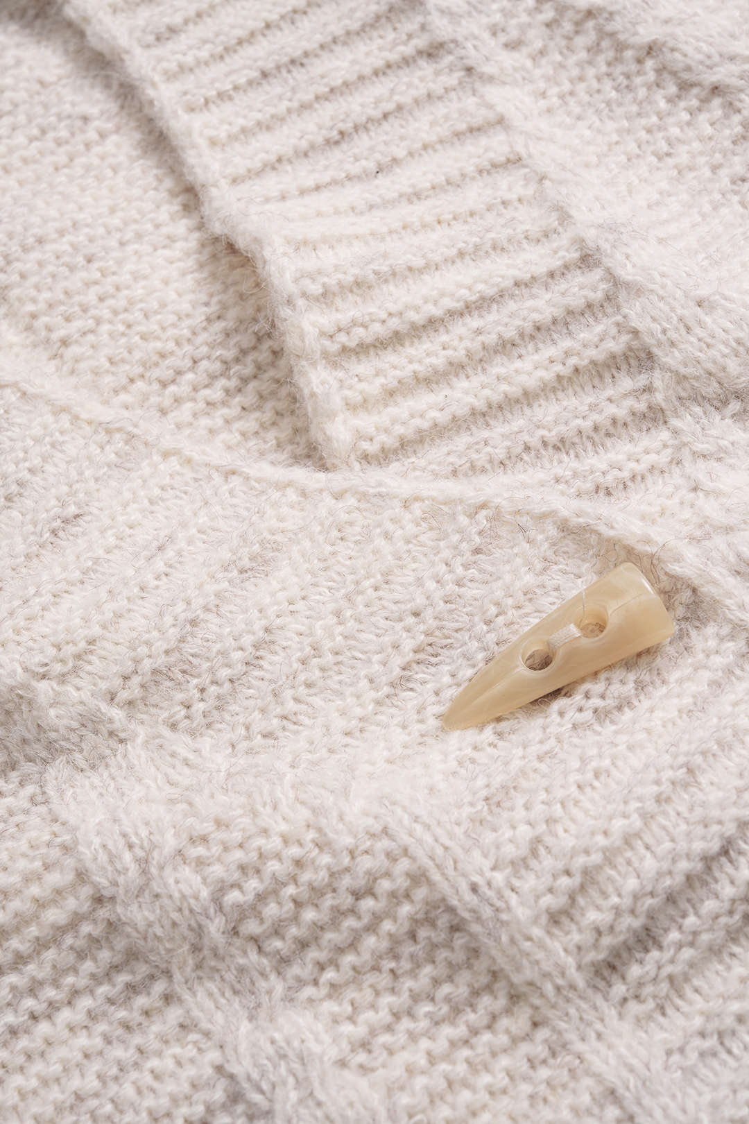 Gilet boutonné en tricot patchwork avec poches