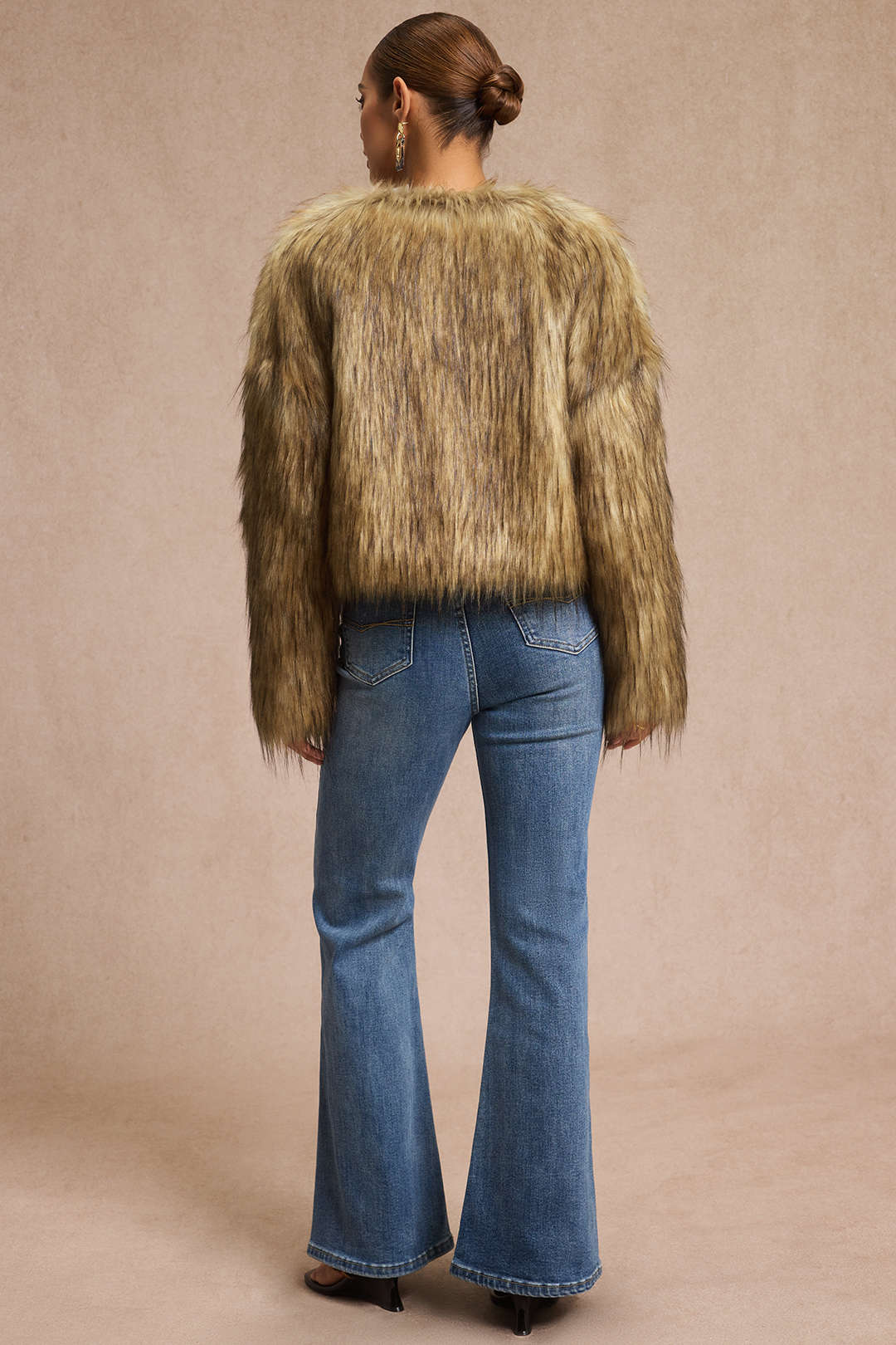 Veste à manches longues en fausse fourrure