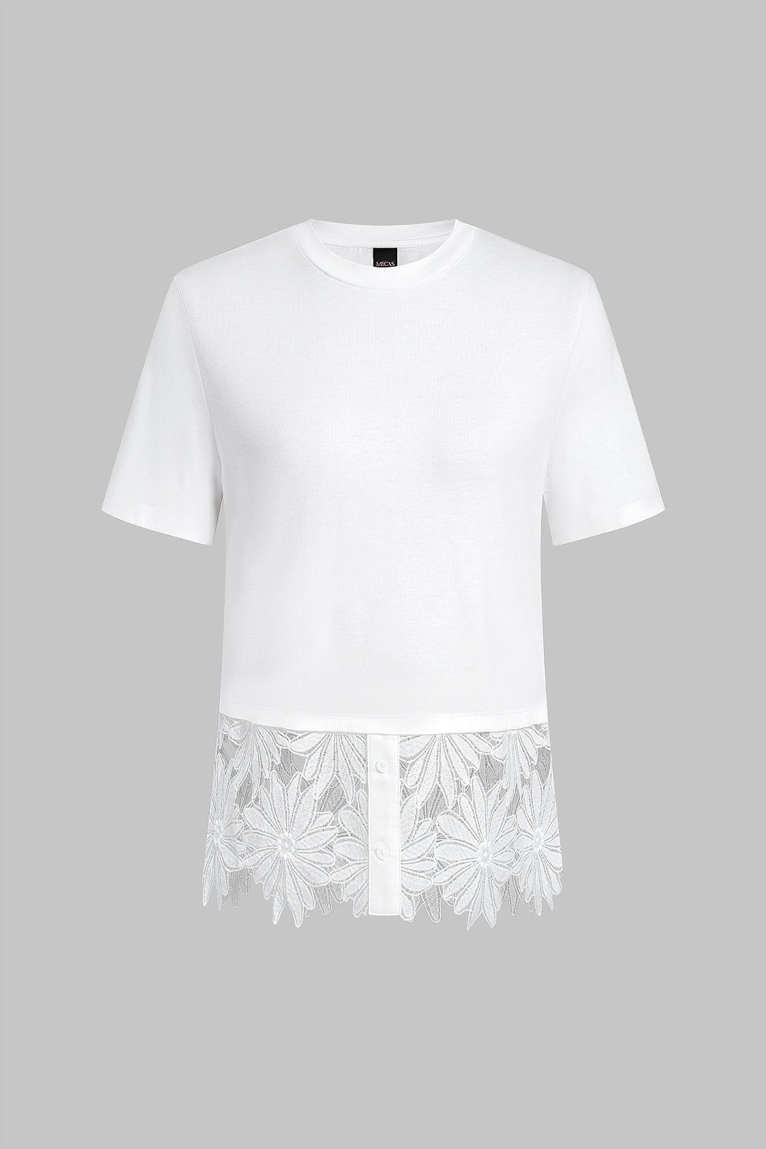 T-shirt uni à patchwork, col rond, ourlet fleuri et manches courtes