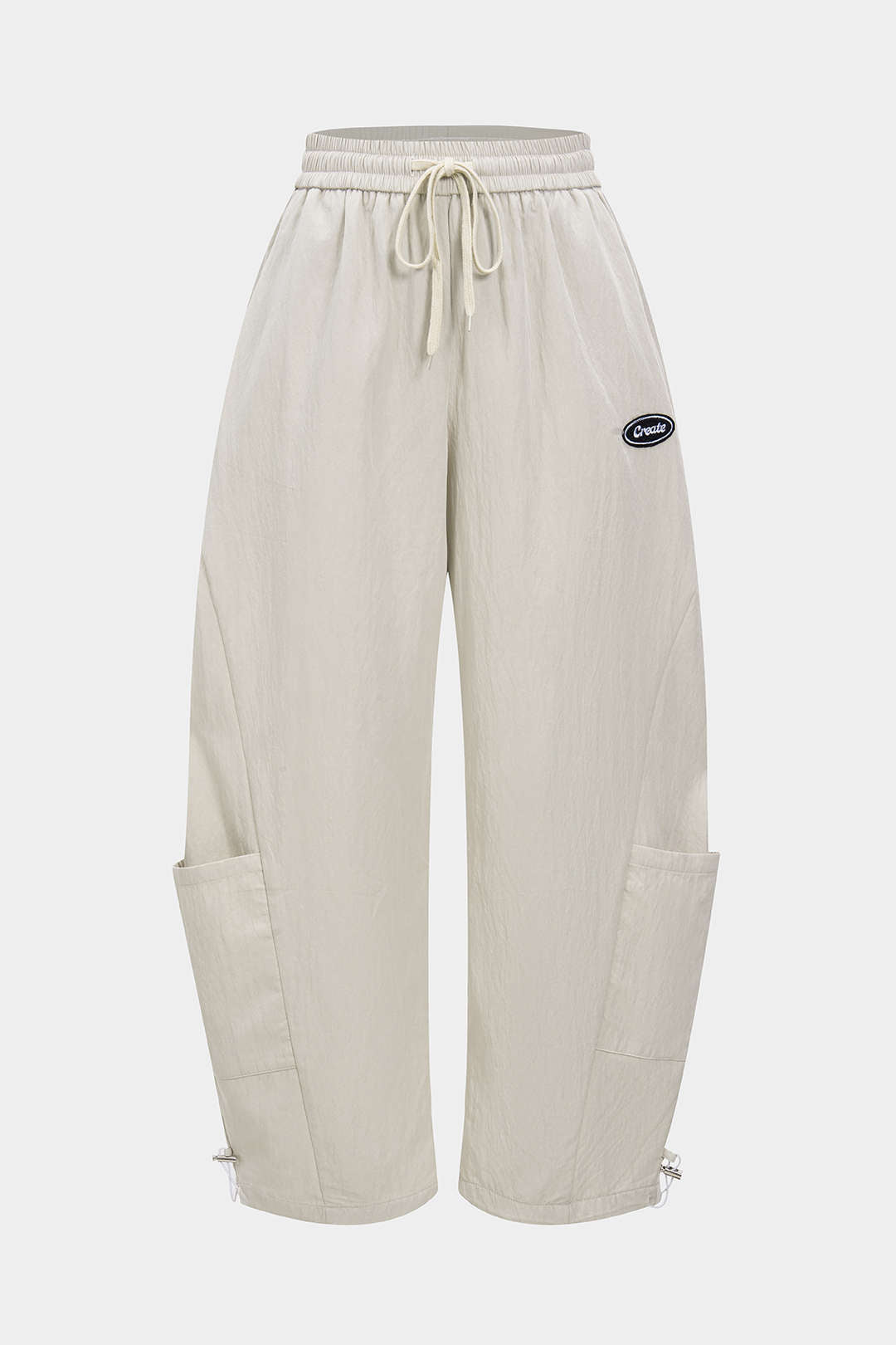 Pantalon coupe tonneau large avec cordon de serrage et poches