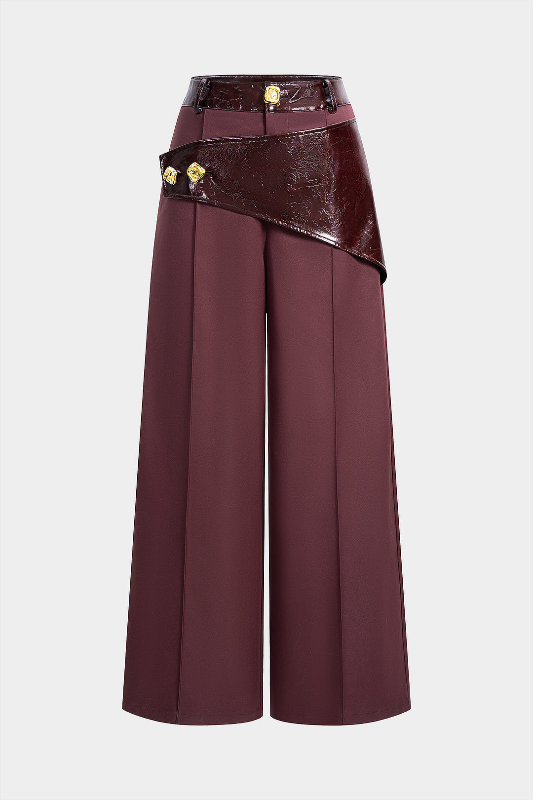 Hose aus Kunstleder-Patchwork mit asymmetrischem Metallic-Knopf und weitem Bein